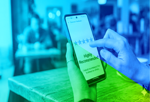 Person holding phone with five star review